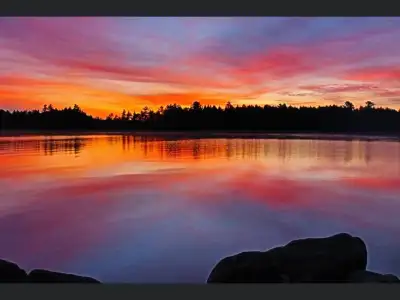 Have you been waiting for an opportunity to own a waterfront acre on beautiful East Grand Lake, New...
