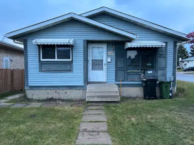 3 bedroom house w/ garage close to train.
