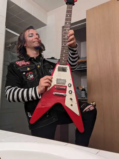 guitarist/metal singer looking to put a hard rock band together, View more