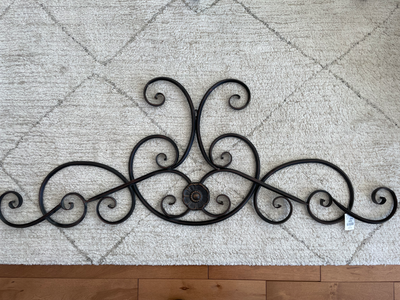 This metal art is 4 ft W x 17 in high. Bought new, never used.