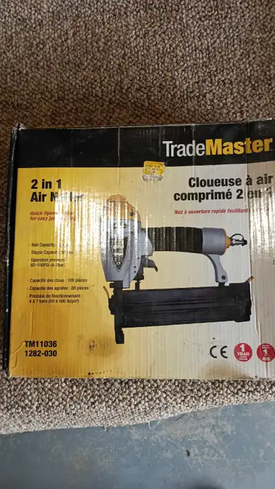 This is a used TradeMaster 2-in-1 air nailer and stapler combo, designed for a variety of projects w...