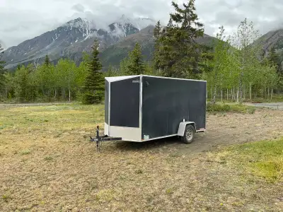 2025 single axle 6 by 13 side man door. Rear ramp door. Spare tire. $9500