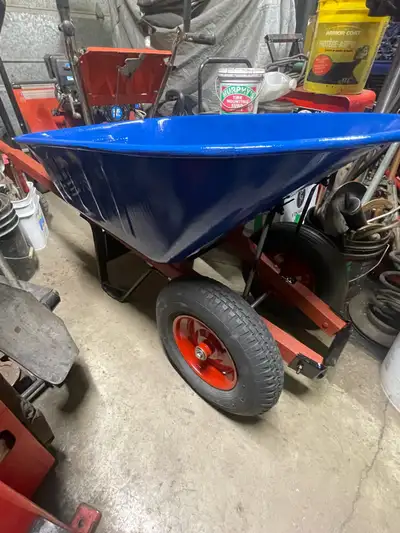 Wheelbarrow ,…. New inner tubes,…. New wheel bearings and fresh paint $80.00