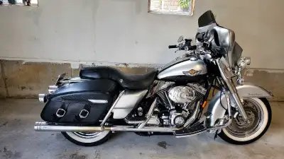 This pre-owned Harley-Davidson Touring motorcycle is ready for your next big adventure, featuring a...