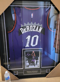 Demar derozan "RARE"signed jersey and picture "one of a kind"