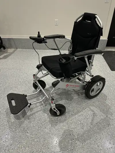 Electric wheelchair for sale “Travel Buddy” Folds down nicely to fit in the trunk of your car slight...