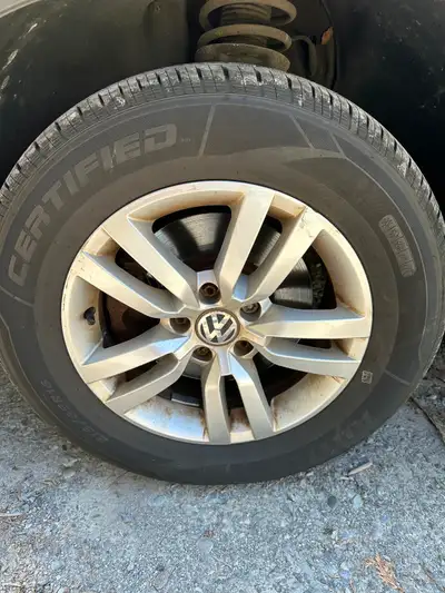 Volkswagen rims and tires like new condition. $500. or best offer ASK FOR RICK