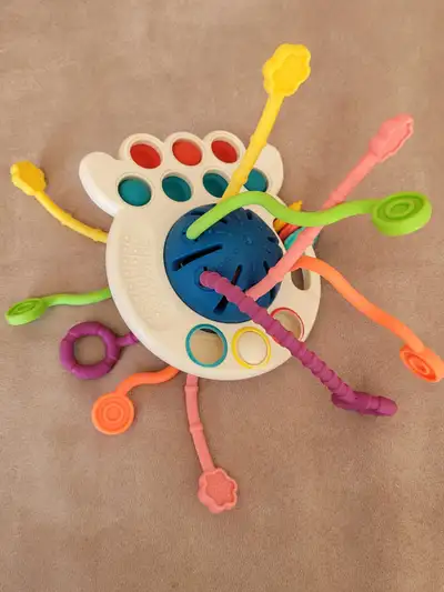 Montessori Sensory Toy UFO Silicone Pull String Teething Toy, View more