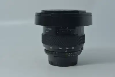 ( Tokina AF 20-35mm f3.5-4.5 + hood ID 1053 ) Price: ($450) + Tax Includes 60 days / 2 months warran...