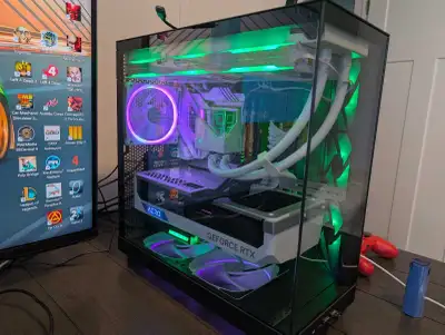 Custom gaming desktop with 43" 4K monitor Has 128gigs of ddr4 4080 super 5T of ssd Intel i7 14700Kf...