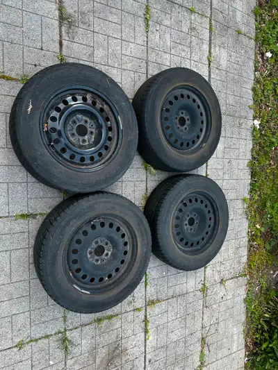 A set of 4 steel rims and tires come off from 2004 RX 330.