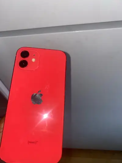 iPhone 12 (64GB) Product Red edition in great condition All original parts & fully functional. Free...