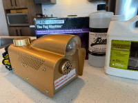 Fog machine, used once, includes 2 bottles of liquid