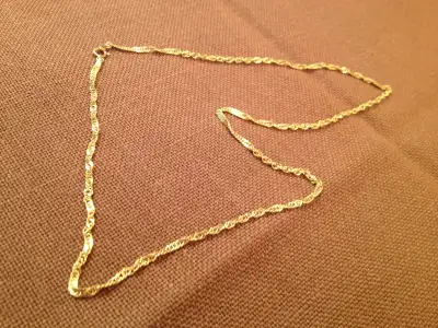 Yellow gold chain 9K. [ stamped 375] . 17.5 inches.. 3.1 grams ., View more