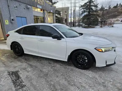 2025 Honda Civic sport touring sedan with Honda Plus 7 year, 160,000km bumper to bumper extended war...