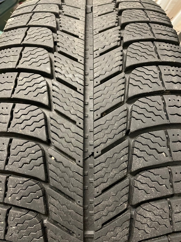 Michelin Xice snow and ice tires on steel rims for a Honda Civic