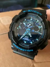 Casio GA-100CB blue camo dial G Shock watch 50mm