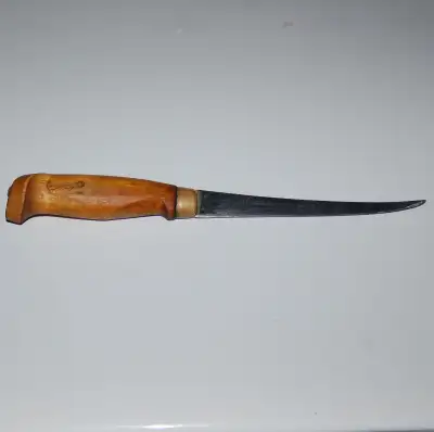 Finnish Quality Full tang with rivet at end of handle 6" blade 10" overall 20 dollars
