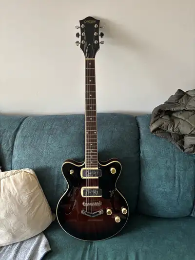 Gretsch hallowed body guitar with soft case., View more