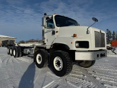 Cummins ISM, eaton fuller 9LL transmission, diff lock, Simard twin steer conversion, 40,000 front, 5...