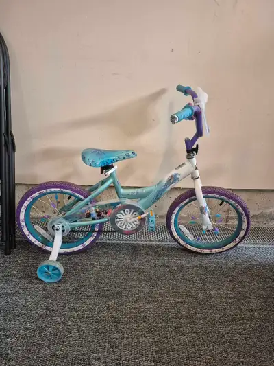 Girls 16 inch Frozen bike with training wheels. In excellent condition.
