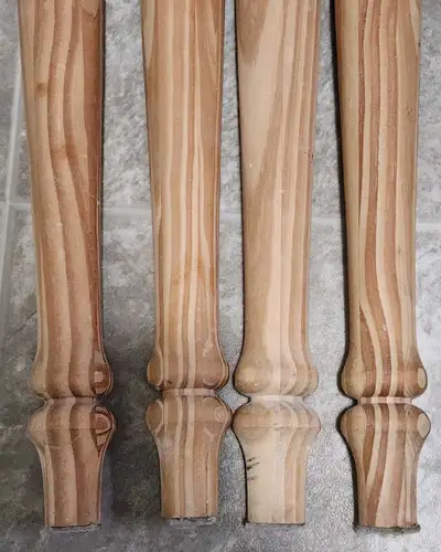 I have a set of 4 unfinished turned wood table legs. Length is 29". One corner is chamfered to 45°....
