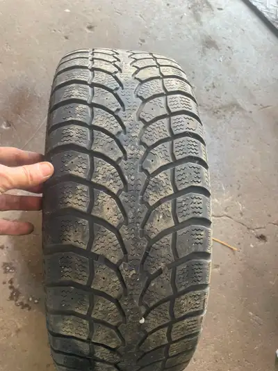 These 215/55R16 winter tires mounted on rims are ready to help you tackle the snowy Canadian roads t...