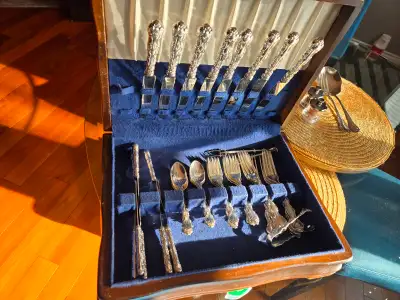 8 place setting plus a bunch if serving spoons and lifters. 92.5 sterling over 50 oz of silver. Set...
