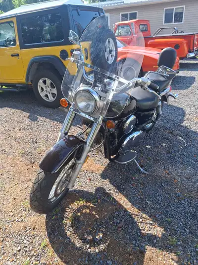 Nice dark metalic purple. 5spd carved. Much work done . Tires at 80%. Foot pads heel toe shifter. Fr...