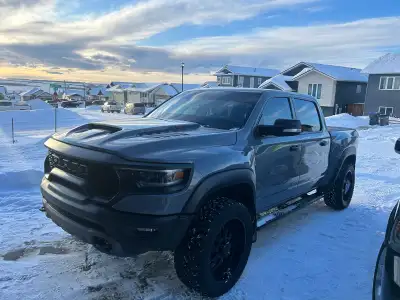 Unleash the fury! This 2022 Ram TRX is the ultimate thrill machine – supercharged 6.2L HEMI V8 pumpi...