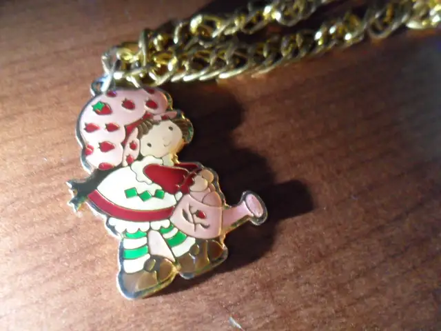 Vintage Strawberry Shortcake Ring and Bracelet. $30 for both.  C63735875854337124