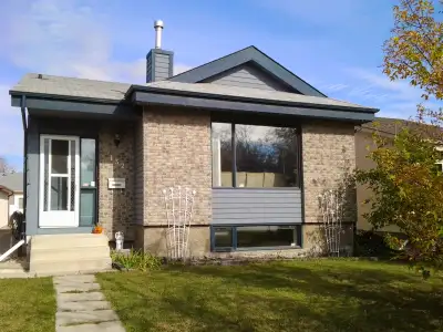 4 bedrooms with 2and1/2 bathrooms,detached garage with extra parking pad ,near Julie riel elementary...