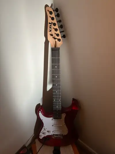 electric guitar with amp and pedal, View more
