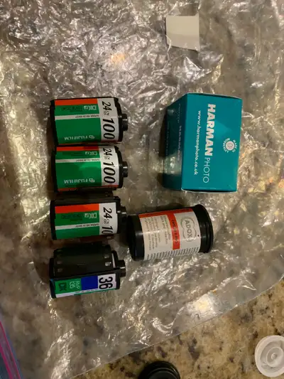 Brand new roll of Azure switch And 3 rolls of Fuji superia 100 A roll of Adox and Velvia 50