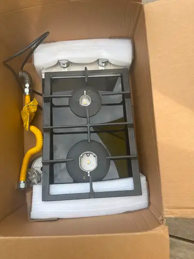 Was installed in tiny house but never used. 2 Burner Gas Stove Top, built in tempered glass surface...