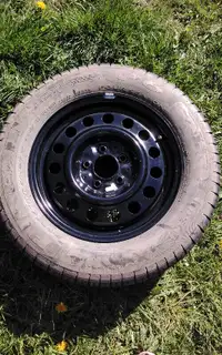 One brand new 225/60/16 tire on rim