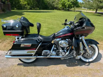 Stock 96 with only 75 357kms. Tastefully customized. Great touring bike with both detachable back re...