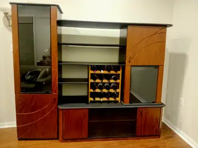 Attractive cabinet for storage, books and display. Glass cabinets with glass shelves. Closed cabinet...