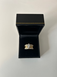 Solitaire Marquise ring with two wedding bands