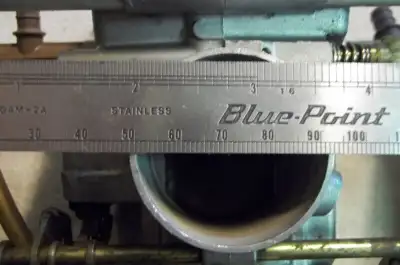 Triple Mikuni's, were on a Thunder Cat sled, measure 42mm across throat. Asking. $50.00 O.B.O
