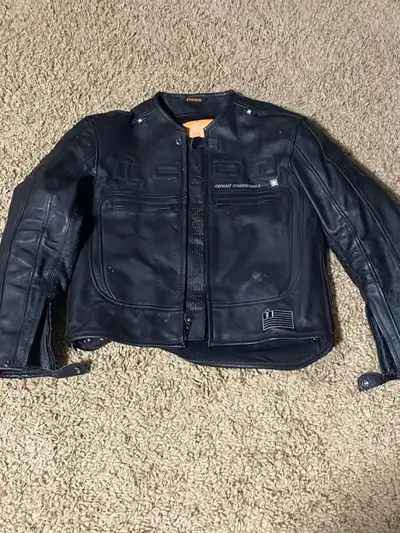 This is an Icon leather jacket, perfect for motorcycle riding, offering both style and protection. I...