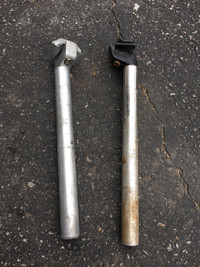 Two bicycle seat posts, non-ferric material, won’t rust.  