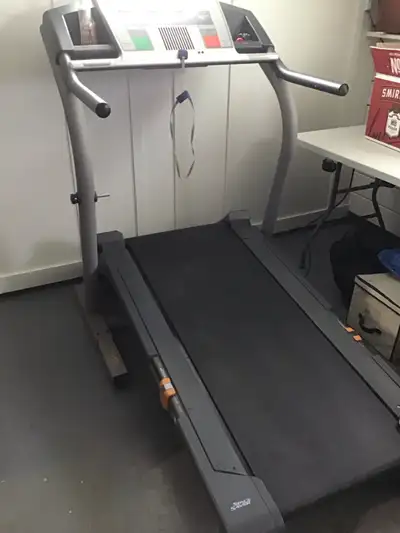 Exercise weight bench and Nordic Track treadmill with incline and multiple speeds,selling both for $...