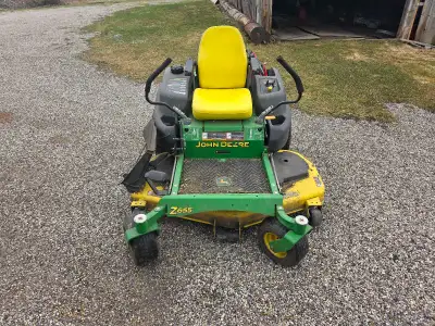 Get ready to effortlessly glide across your lawn with this John Deere Z655 EzTrac zero-turn mower, f...