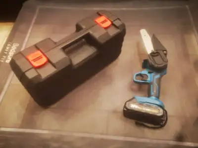 Brand new cordless light weight chainsaw can be used with one hand. Semi elastic grip, very comforta...