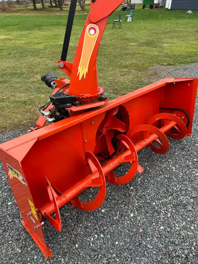 Next to new three year old tractor snow blower. Less than 10 Hours use and has Hydraulic chute. I’m...