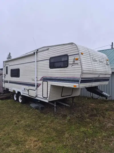 Golden falcon camper. Buy the whole thing or parts. Stove, fridge, windows, door, awning, etc