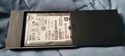 This highly regarded 1 Terrabyte Hitachi/Western Digital TravelStar 7200RPM SATA III hard drive is a...