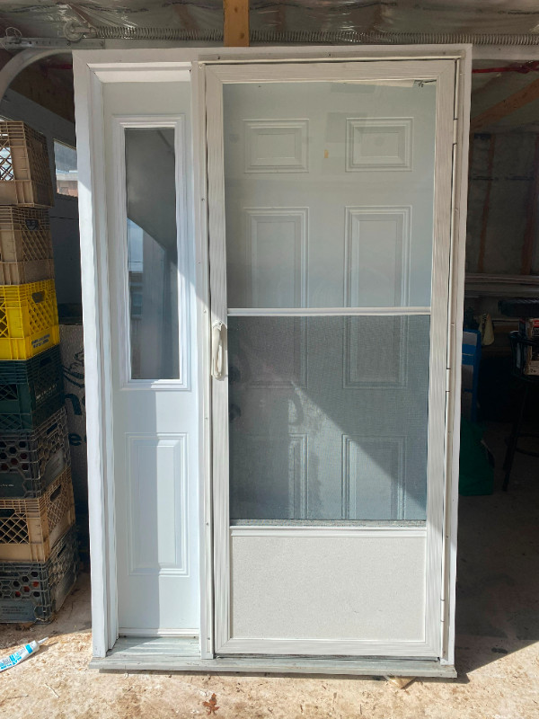 51" Vinyl clad front entry system with 32"door and storm door Windows