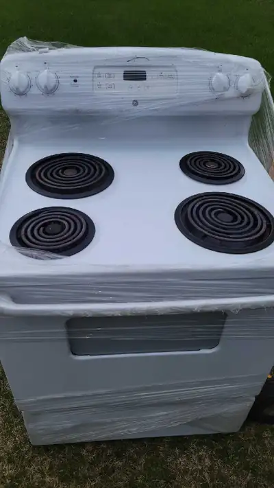Une cuisinière blanche fonctionne super, View more